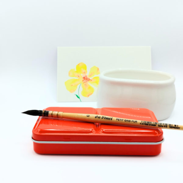 Boîte aquarelle en métal rouge ambiance